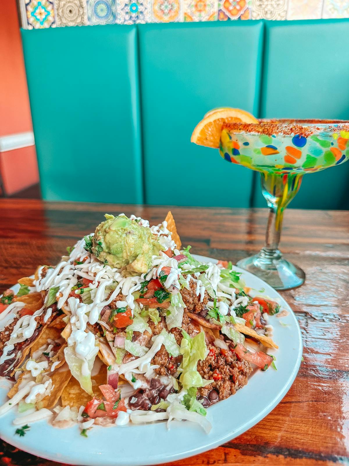 Nachos a mezcal cocktail from Grand Hacienda in Westchase