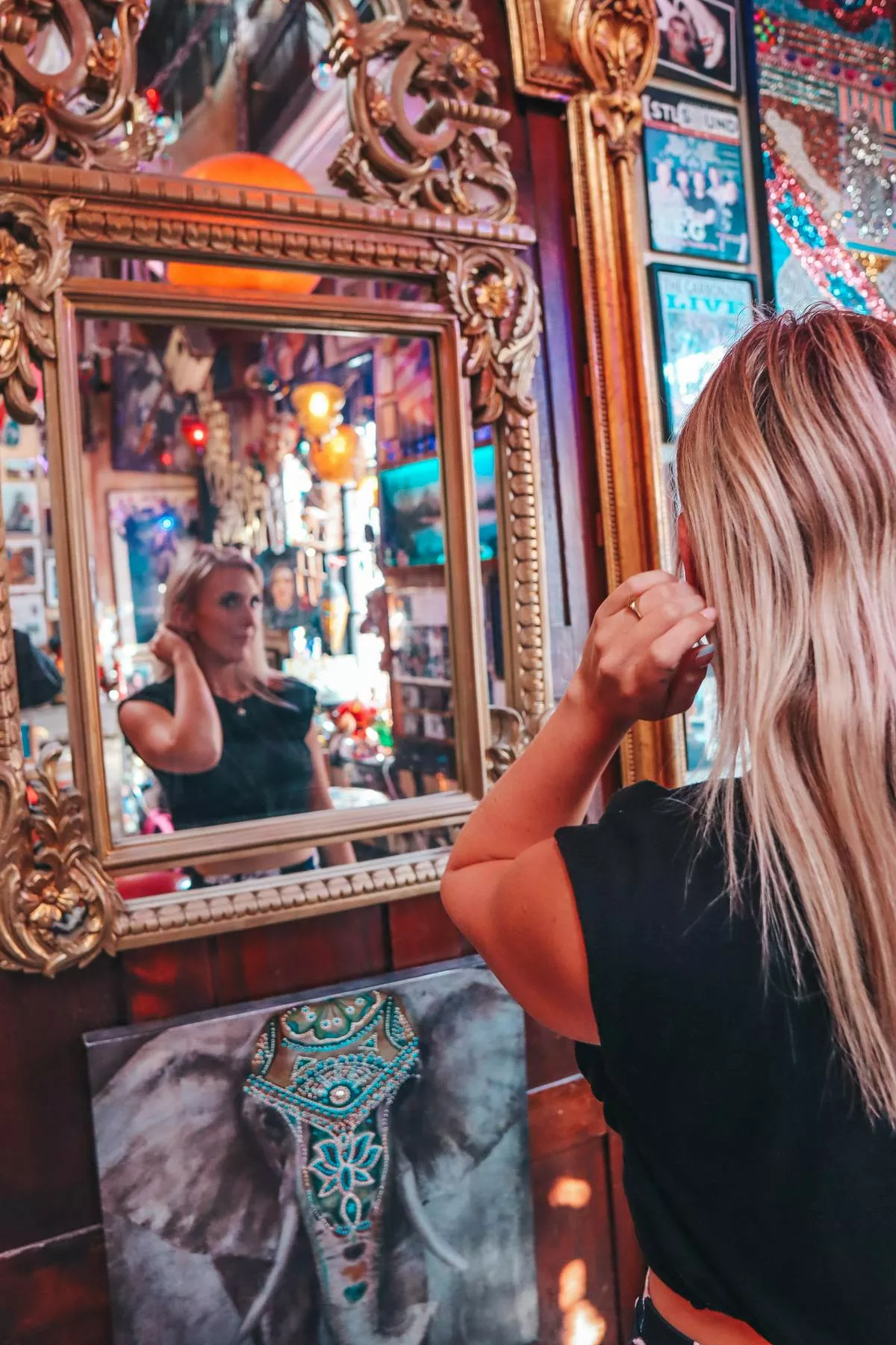 Looking in mirror at Venice Cafe St. Louis