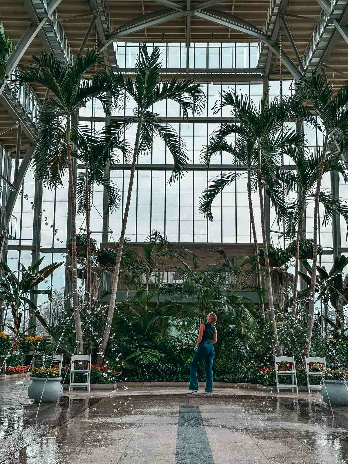 woman in Forest Park building while spending the Weekend in St. Louis 