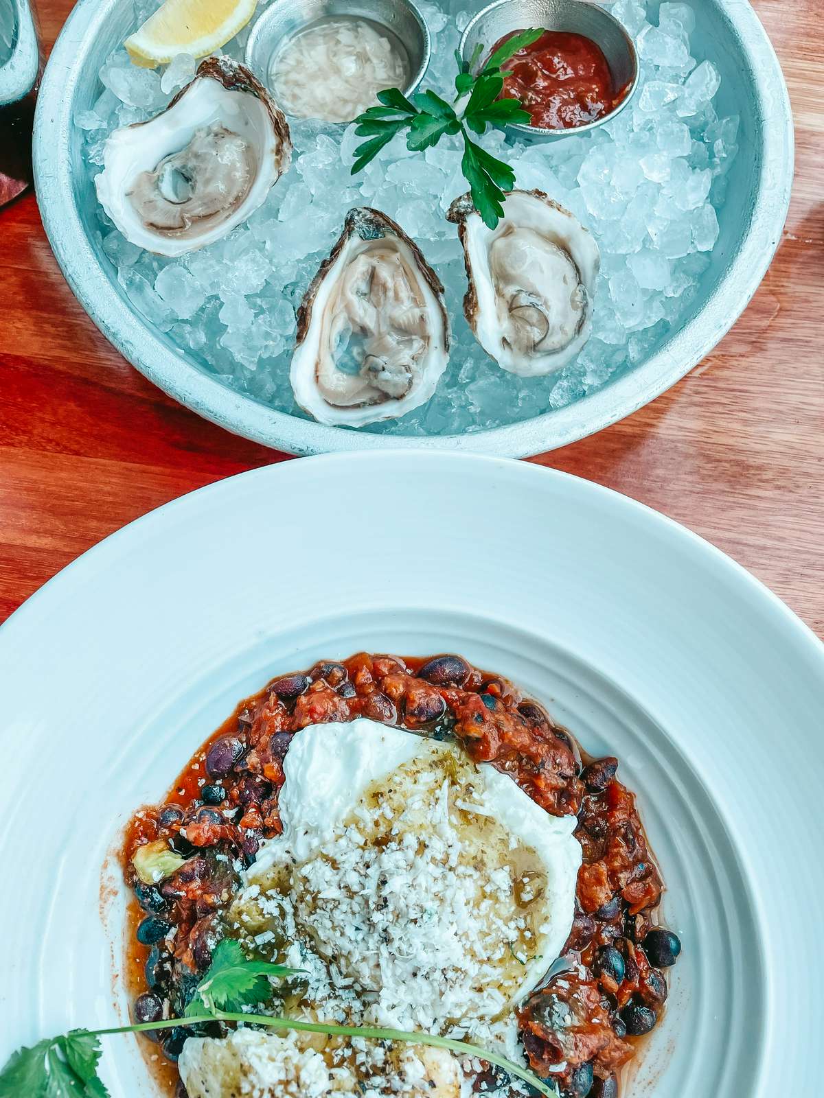 Huevos rancheros and oysters from brunch at The Pearl in Tampa