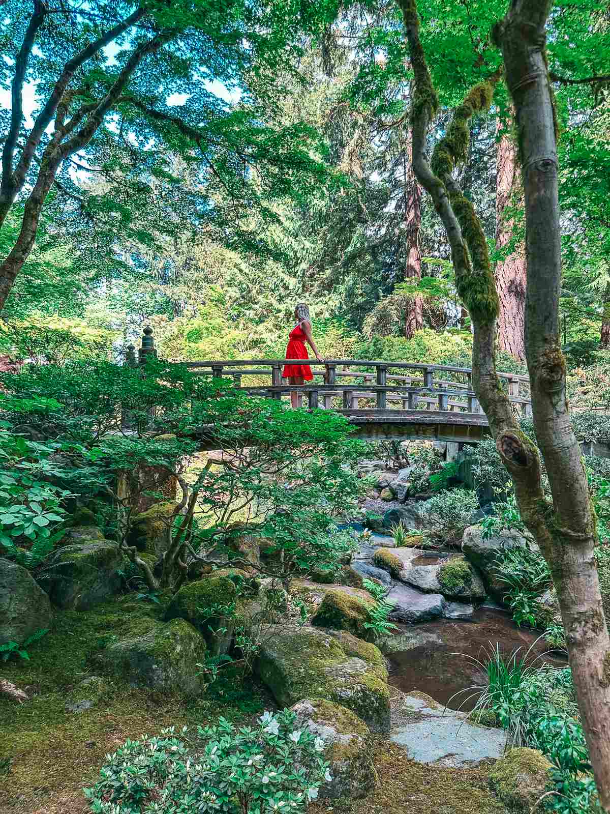 woman in red dress spending the weekend in Portland and visitng Washington Park 