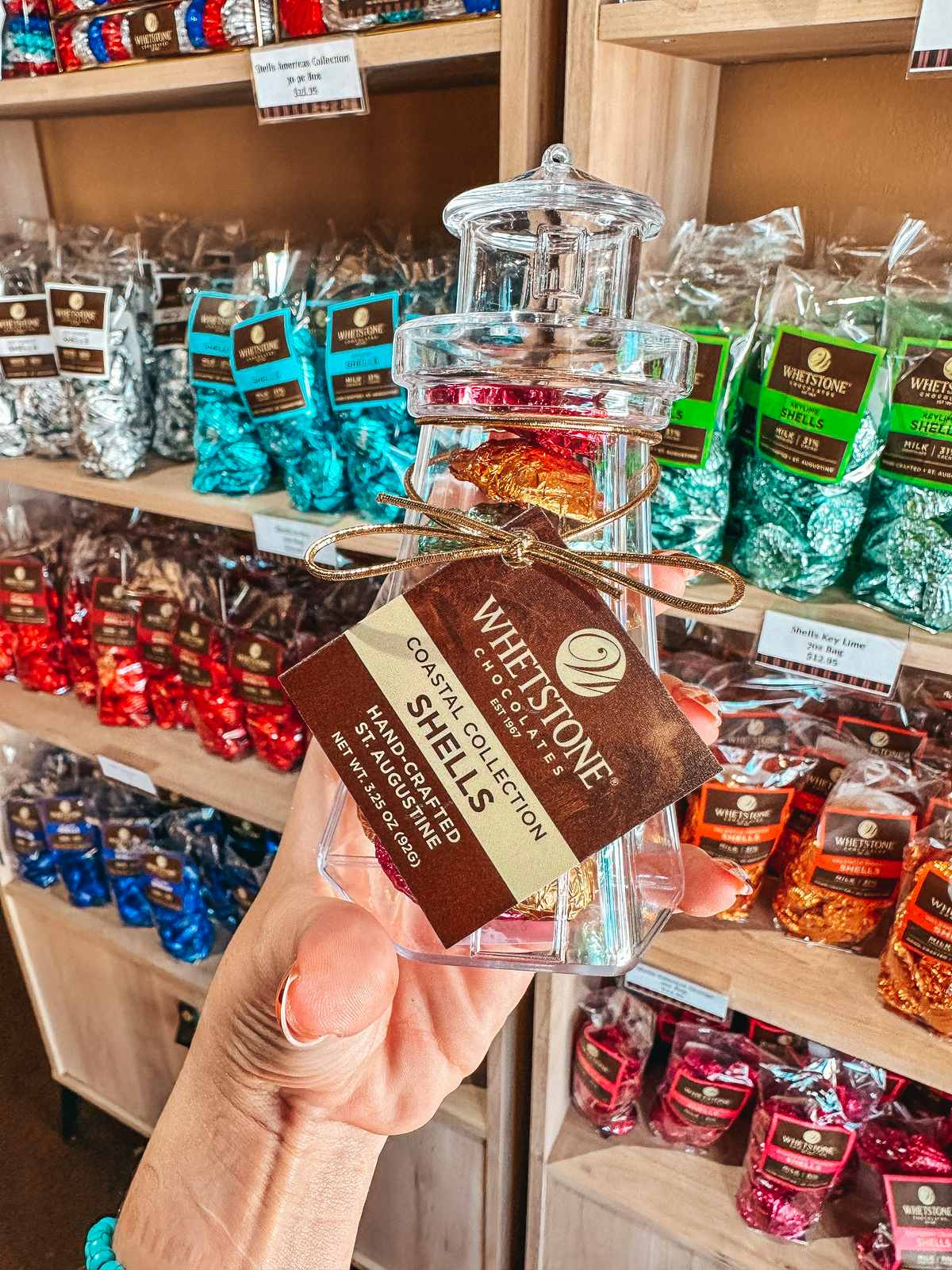 person holding a chocolate in Whetstone Chocolate Factory when you spend a Weekend in St. Augustine