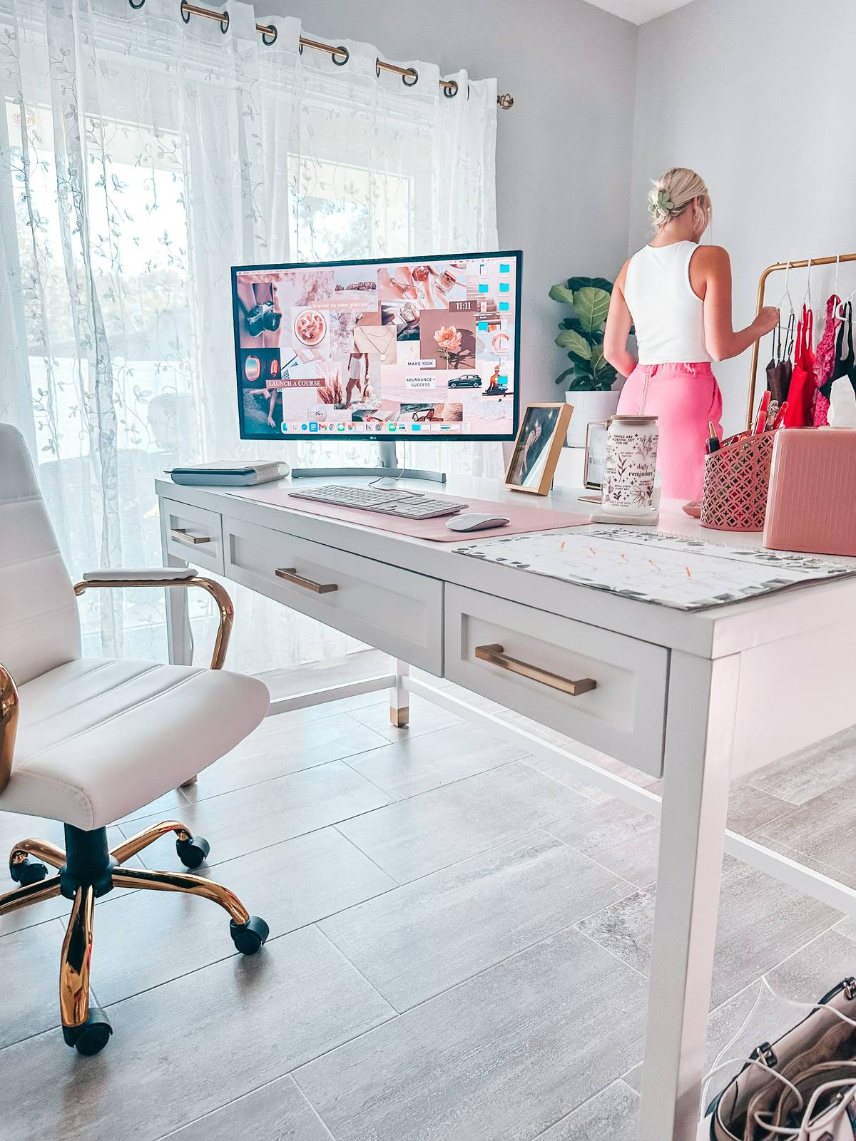 woman in her home office with furniture from dwell home market