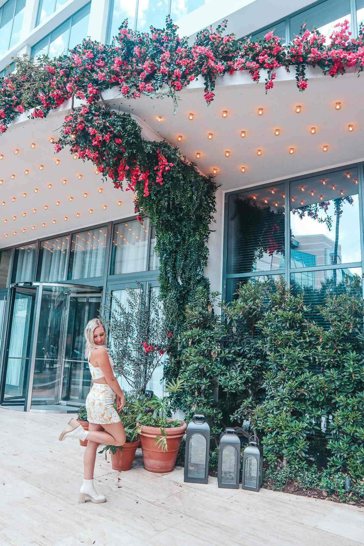 woman standing outside the tampa edition hotel 