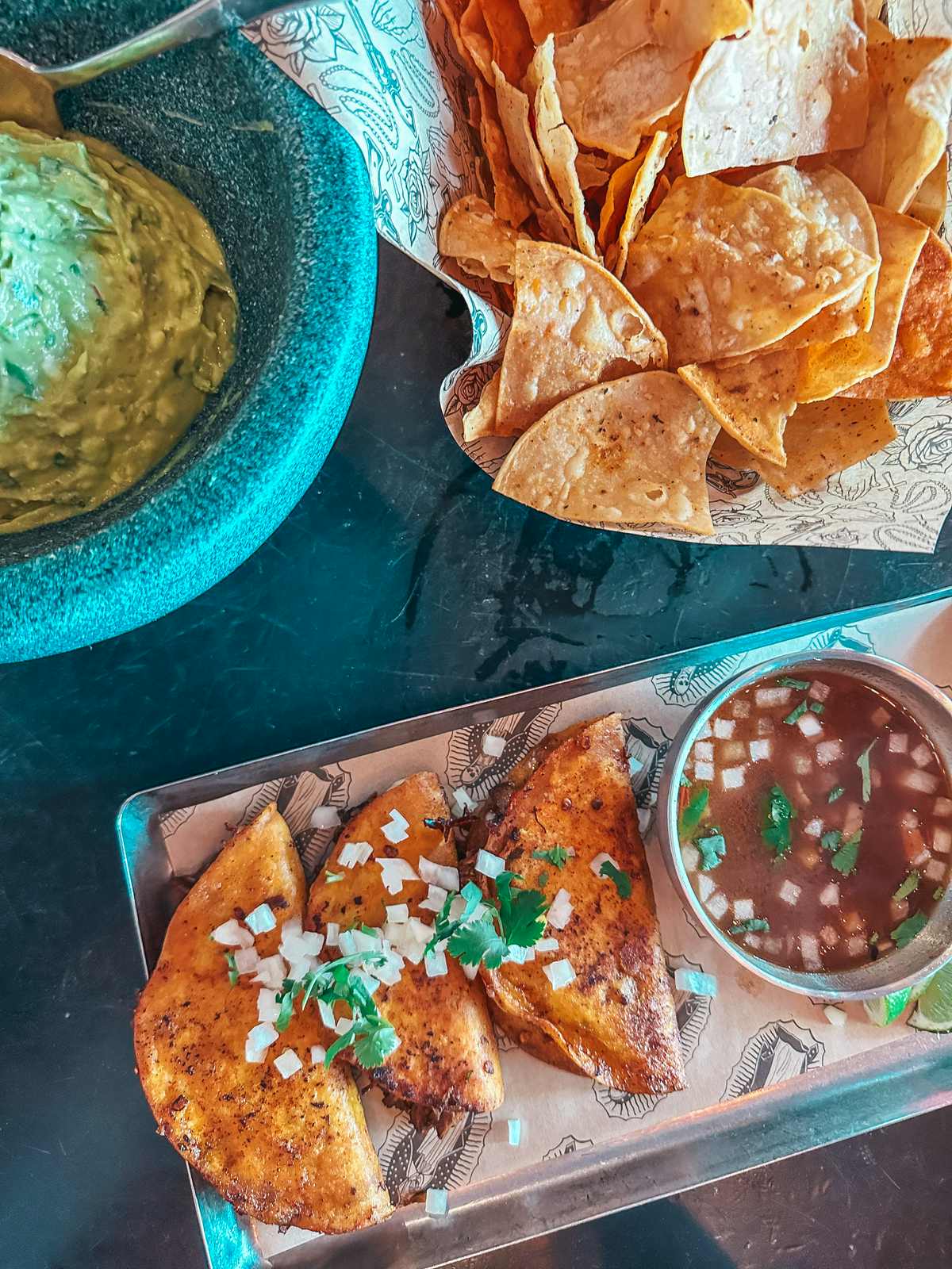 Birria tacos and guac from Calaveras Cantina in Jupiter