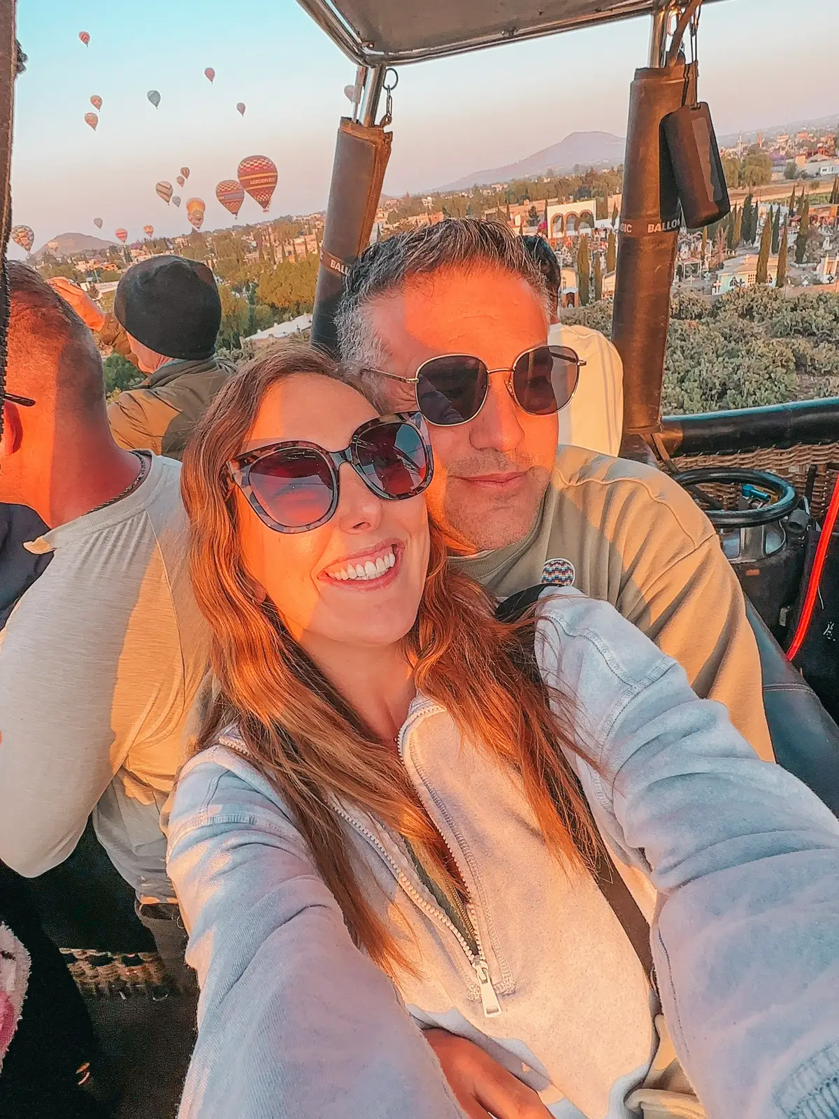 Couple enjoying hot air balloon ride near Mexico City