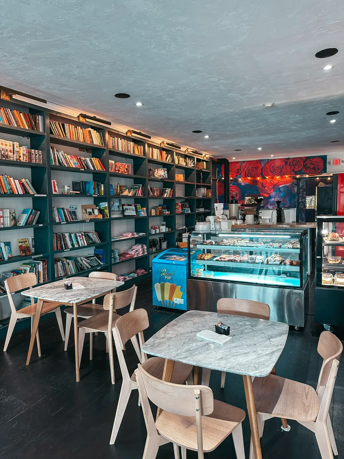 Books and seating at Bread and Roses Coffee Shop in Hyannis on Cape Cod
