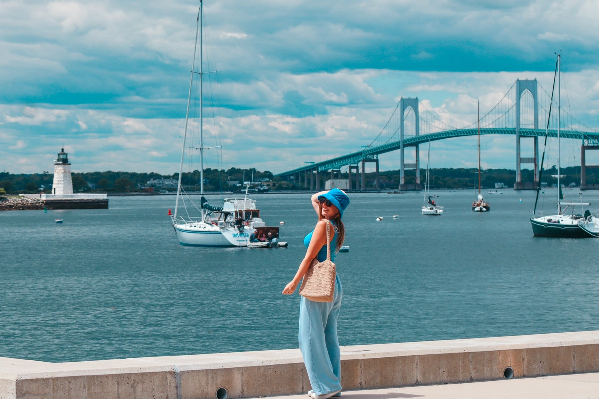 Destiny posing with Newport Bridge and Newport Harbor Light in Rhode Island