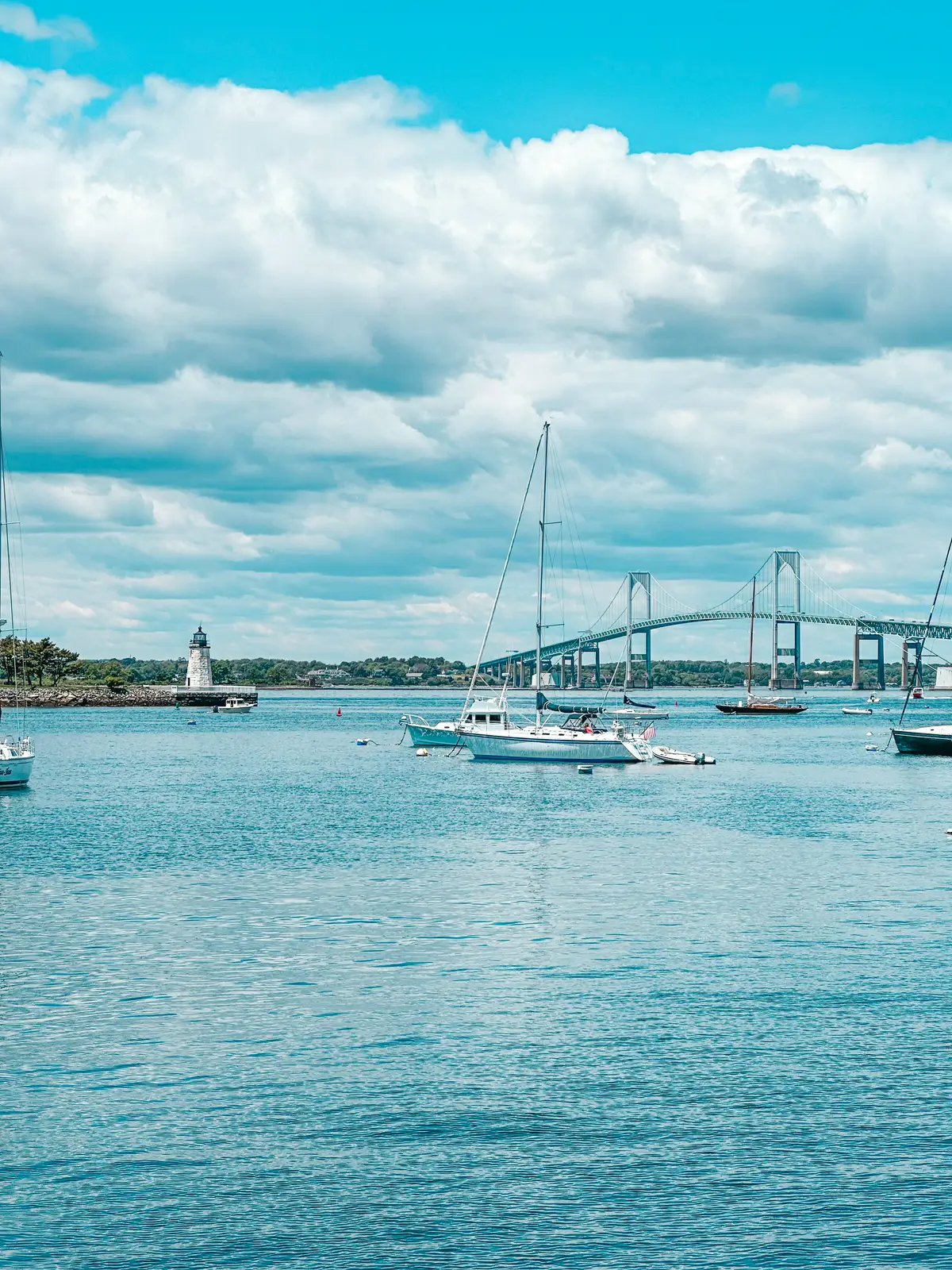 Newport Bridge and Newport Harbor Light in Rhode Island