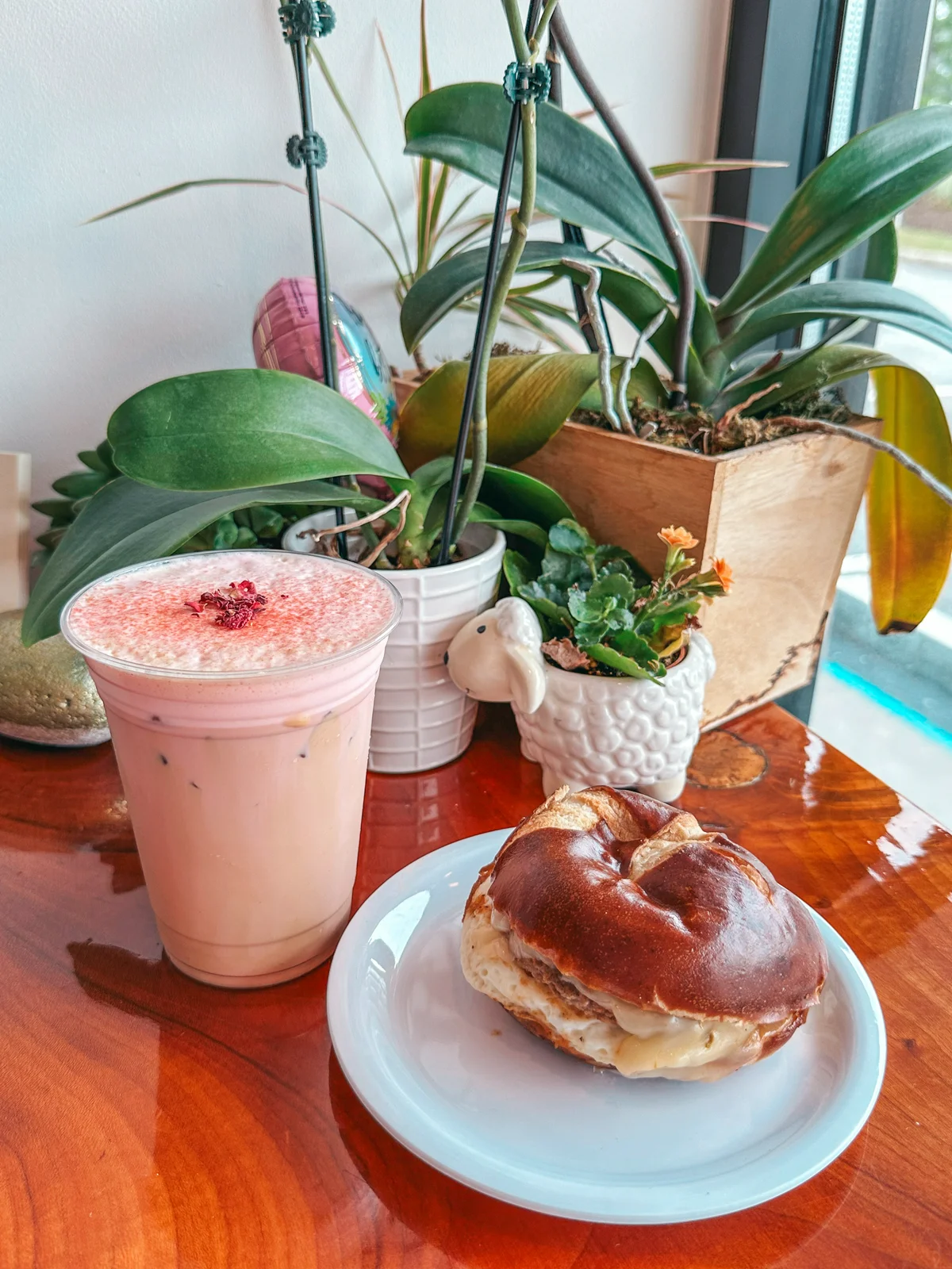 Strawberry rose latte and breakfast sandwich from Great Awakening Coffee Shop on Cape Cod