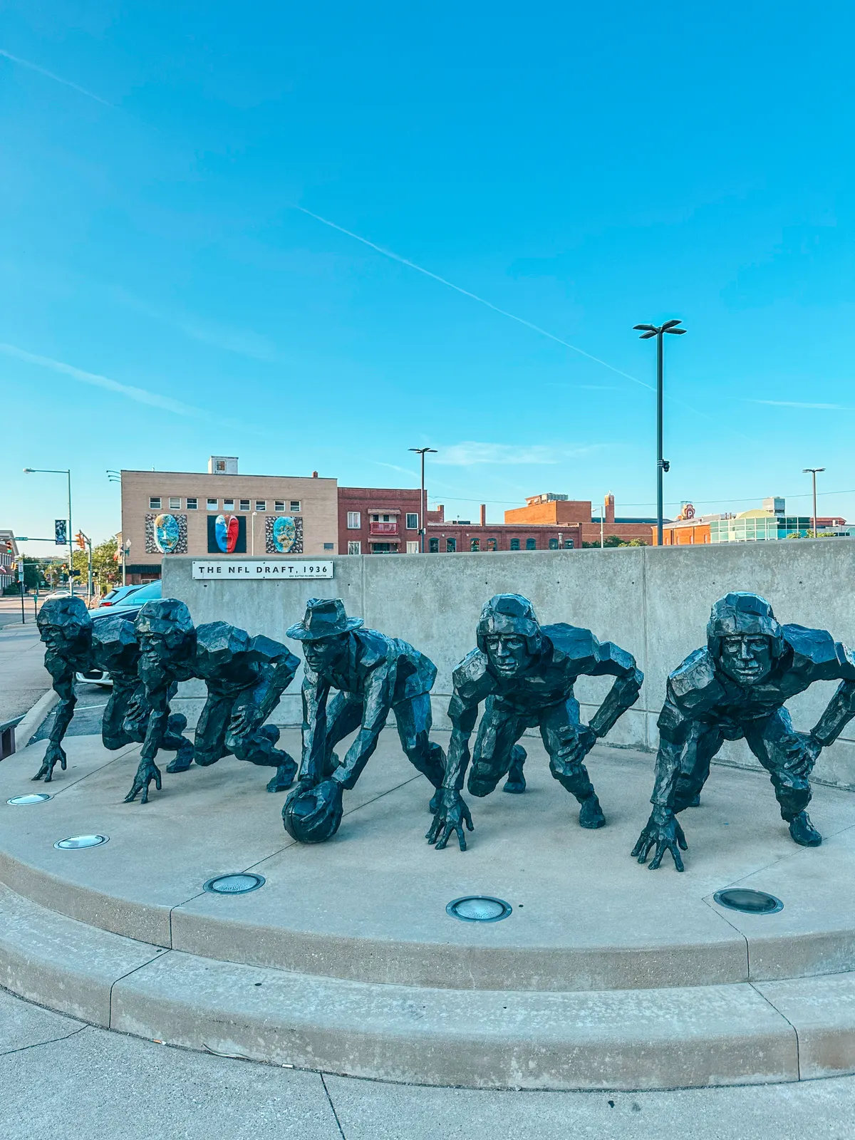 Football statues part of the Eleven in downtown Canton