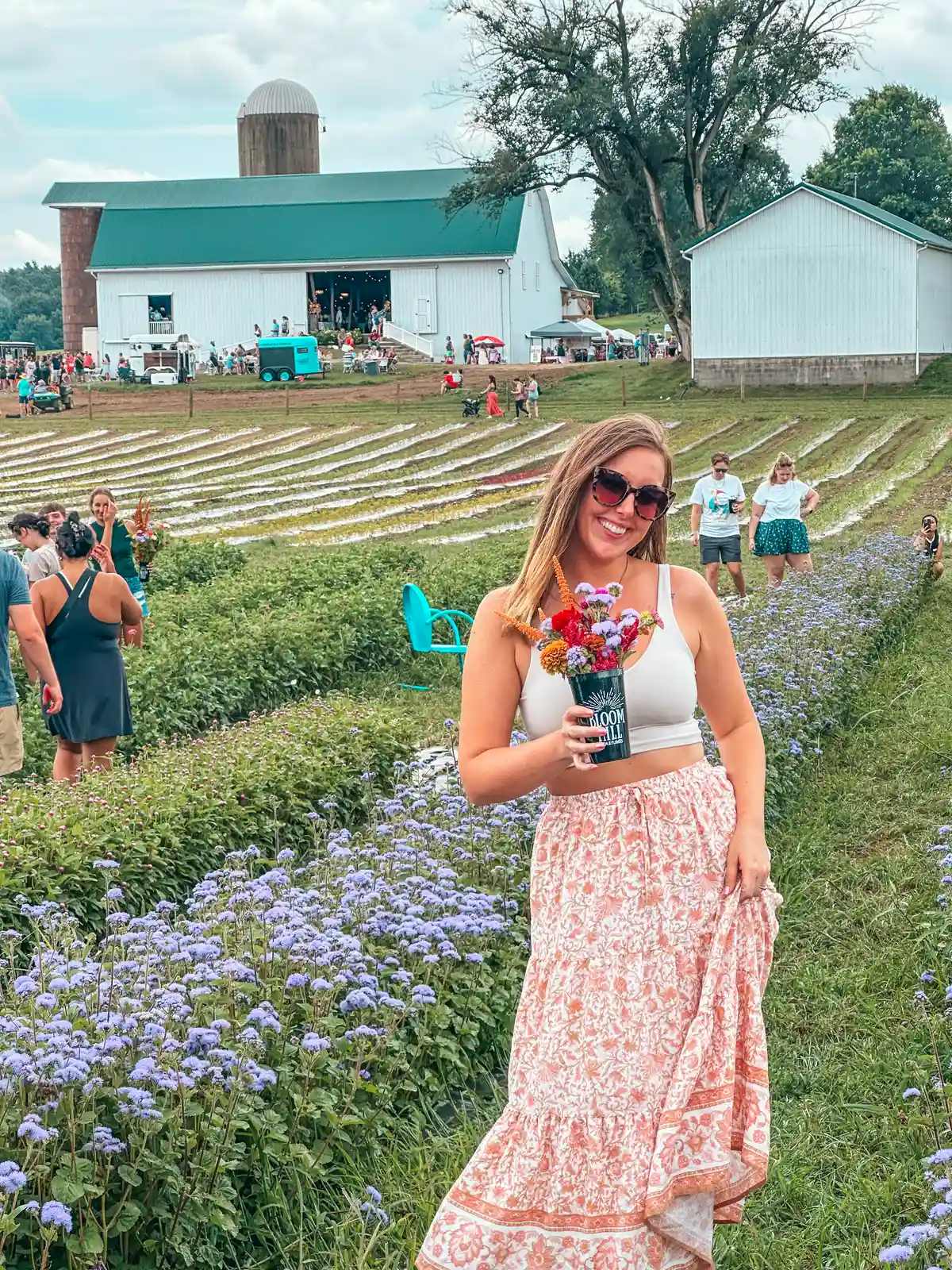 Woman holding fresh picked flowers at Bloom Hill Farm & Flowers in Ohio