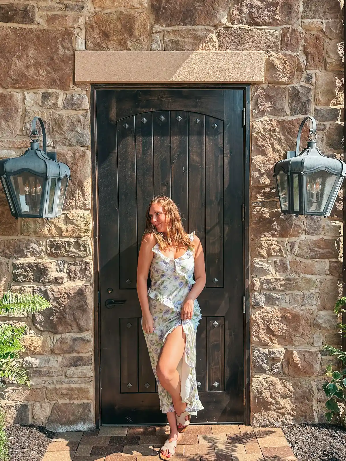 Woman posing in front of a door at Gervasi Vineyard in Canton Ohio