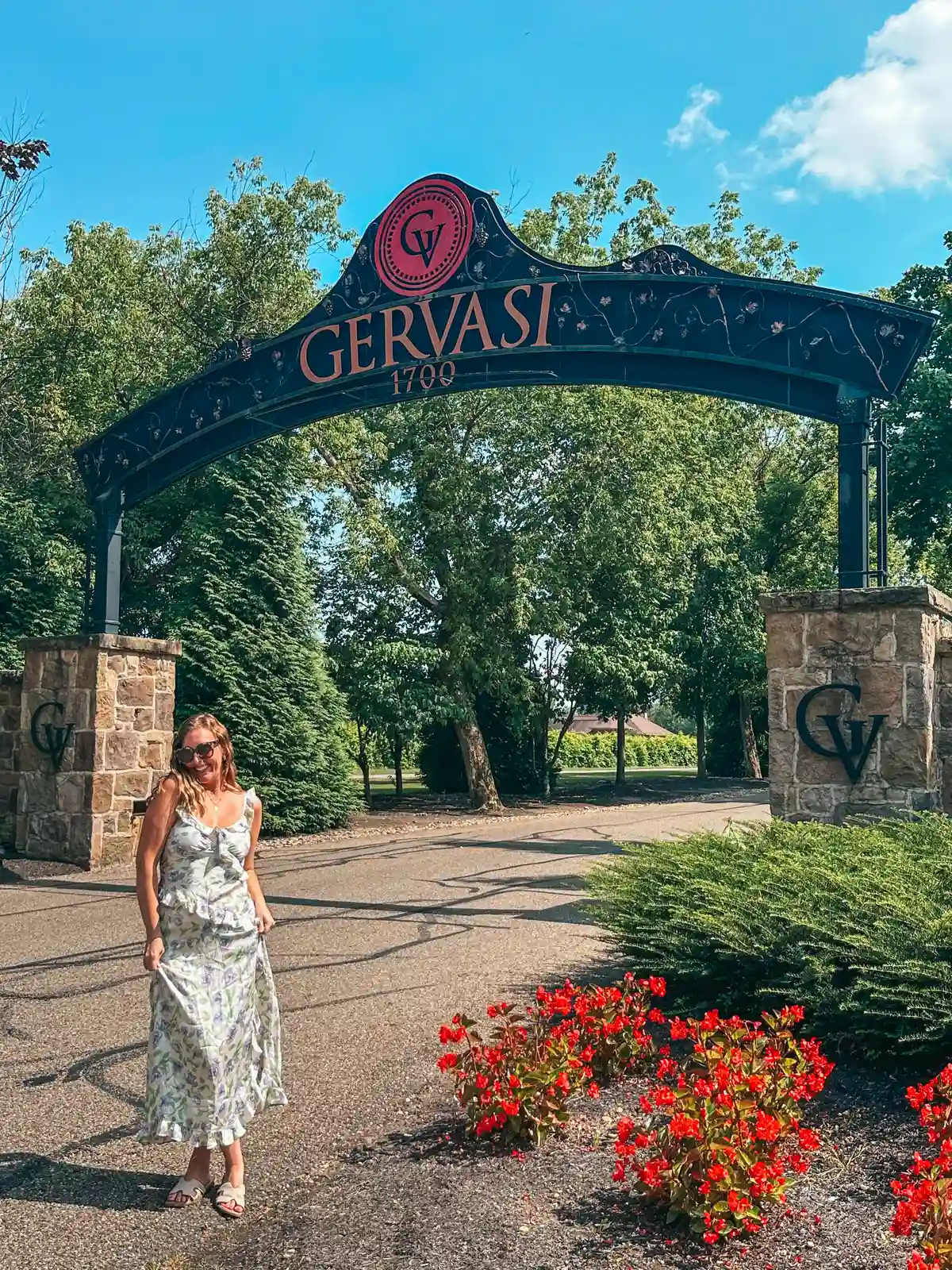 Woman standing at the entrance in front of Gervasi Vineyard in Canton Ohio