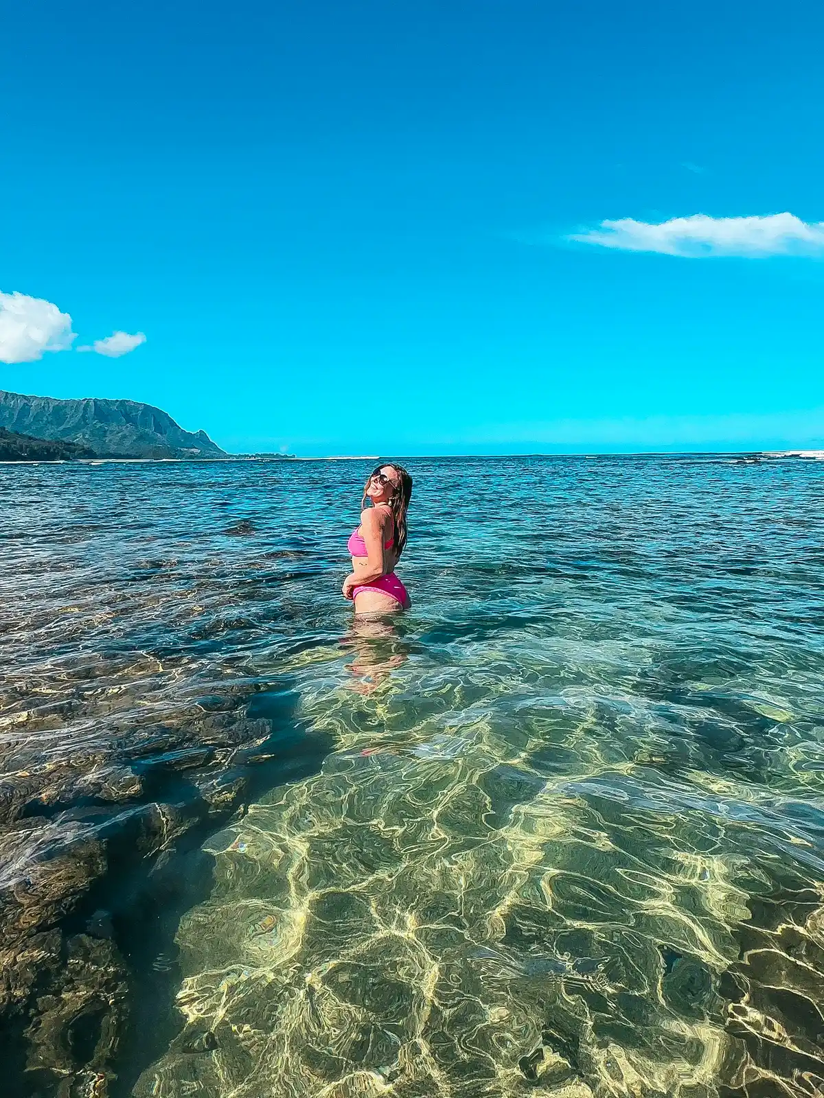 Woman swimming in Hanalei Bay on Kauai