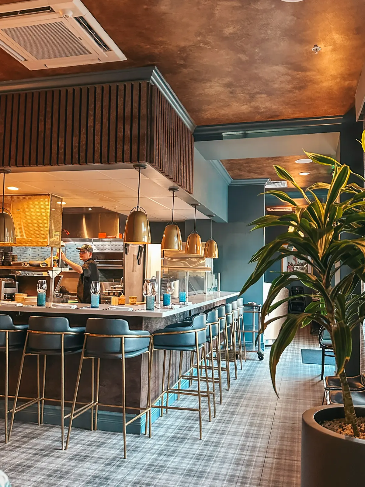 Chef bar seating at HEW Parlor and Chophouse in Dunedin Florida