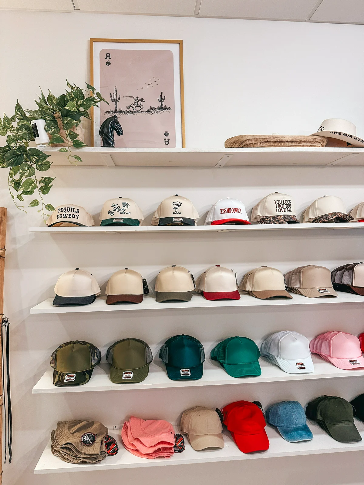 Hat selection at Coastal Cowgirls Collective in Hyde Park