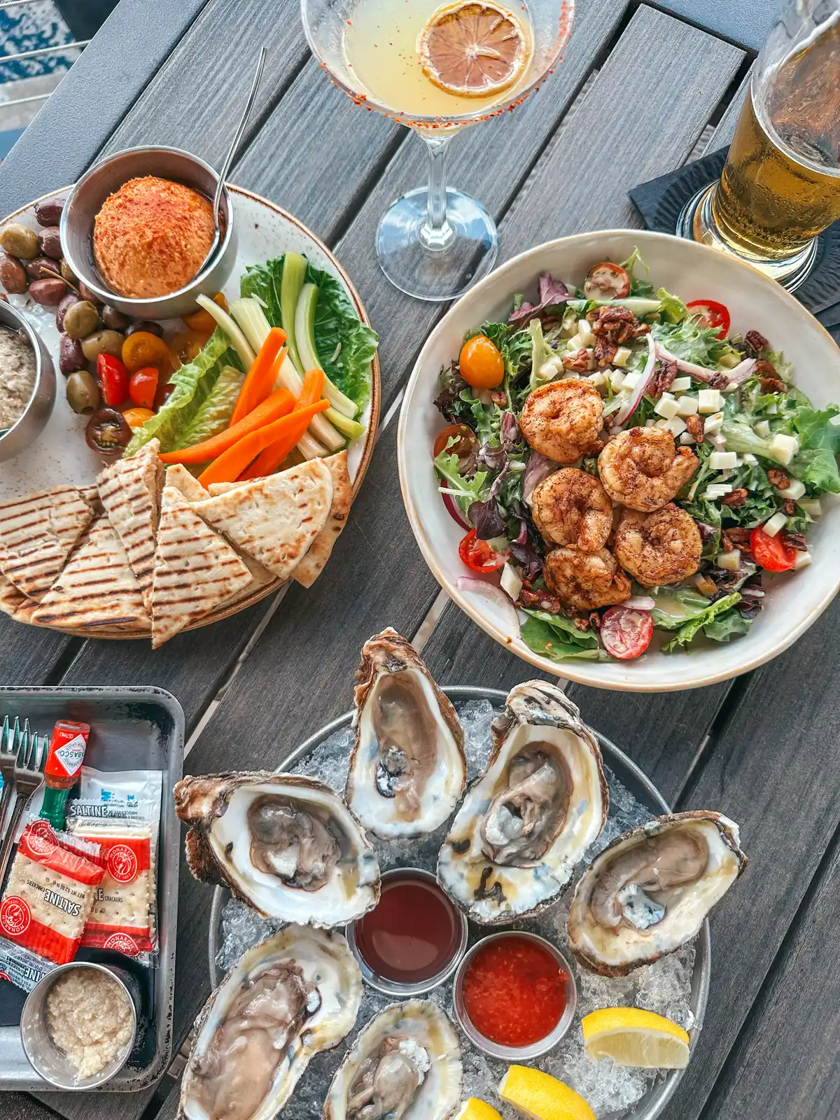 Oysters, salad, and hummus plate from Oxbow Bar and Grill in Fort Myers