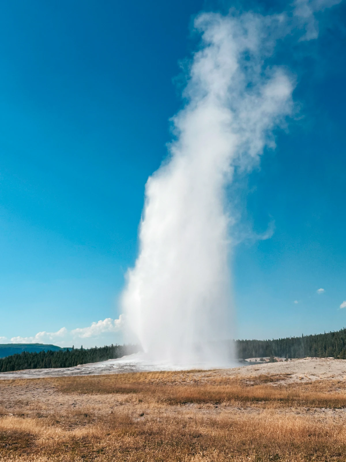 Old Faithful Geyser Erupting At Yellowstone National Park