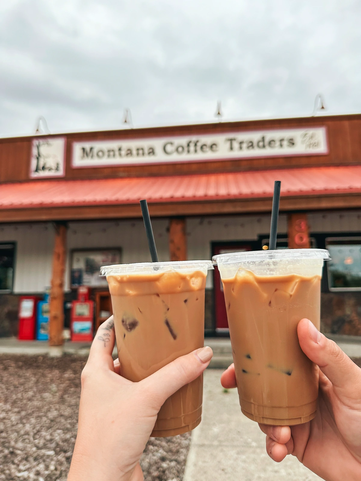 Cheersing Iced Lattes From Montana Coffee Traders In Columbia Falls