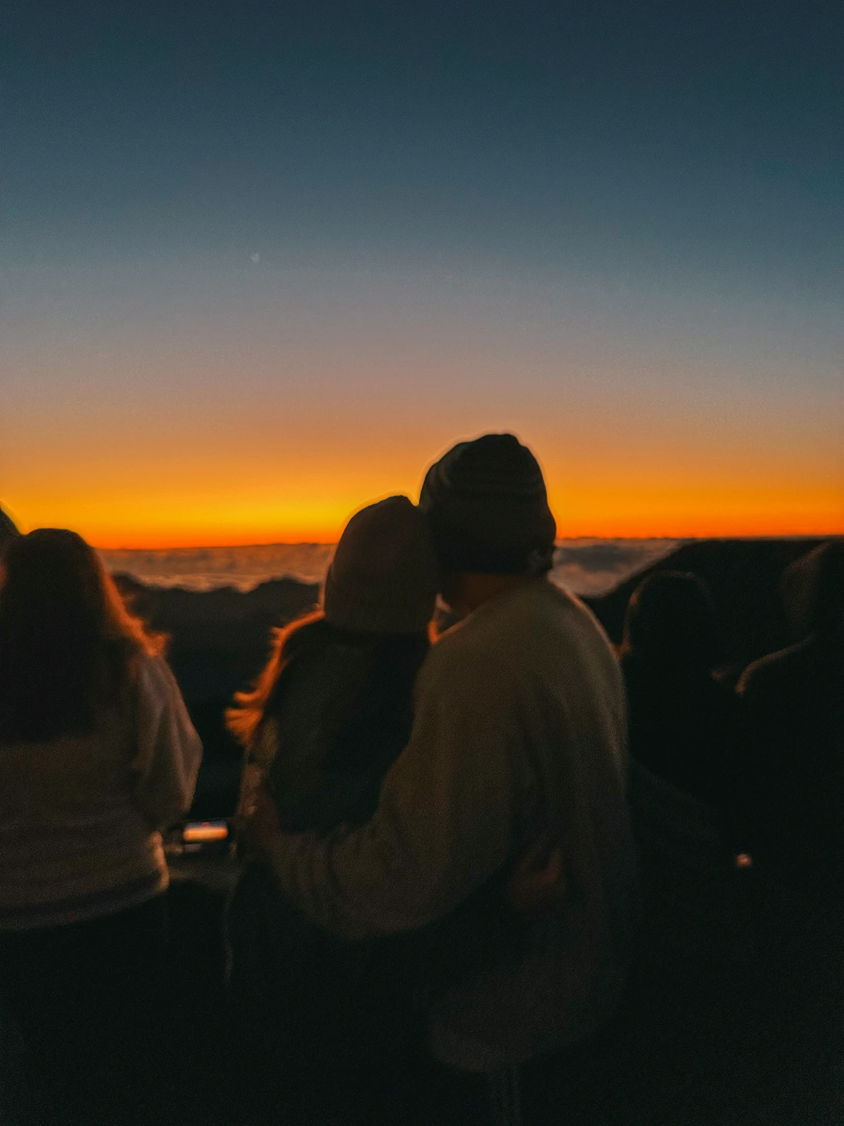 Couple Watching Sunrise At Haleakala On Maui