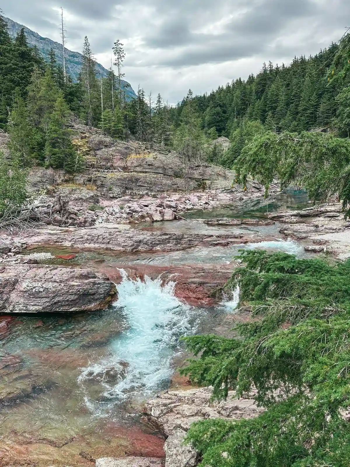 Red Rock Falls In Glacier National Park