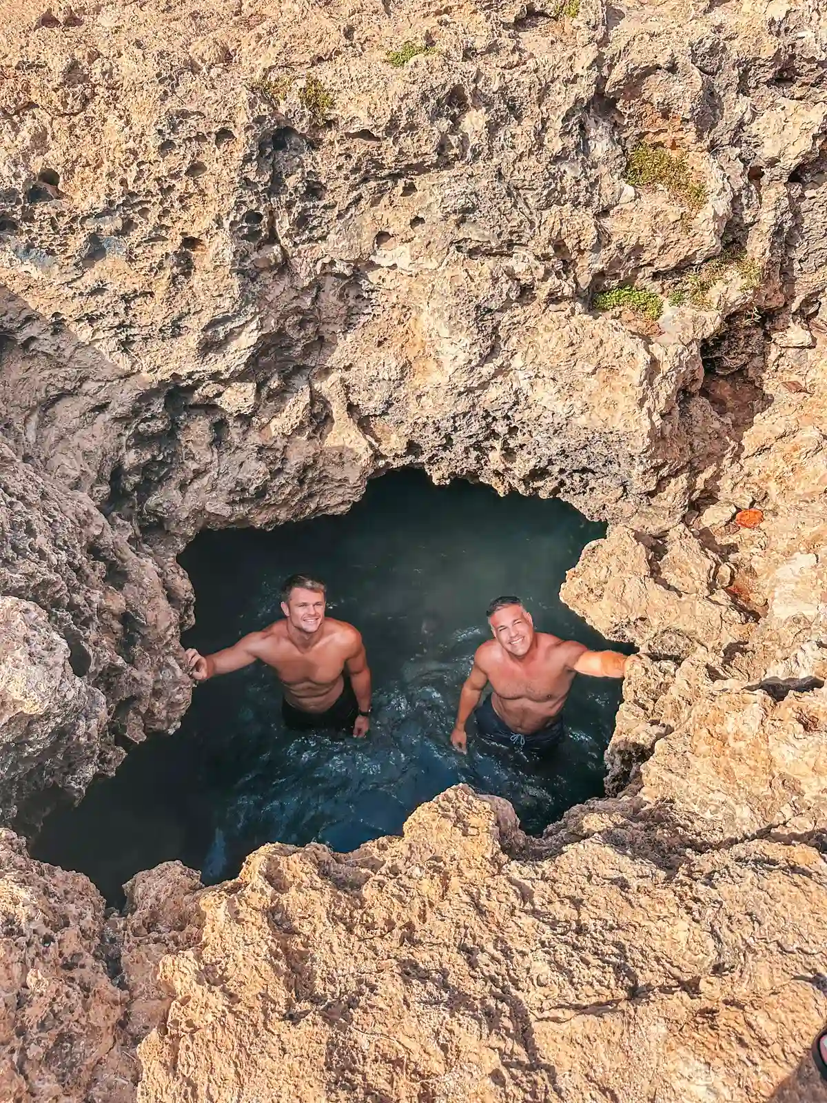 Two Men In Mermaid Caves On Oahu