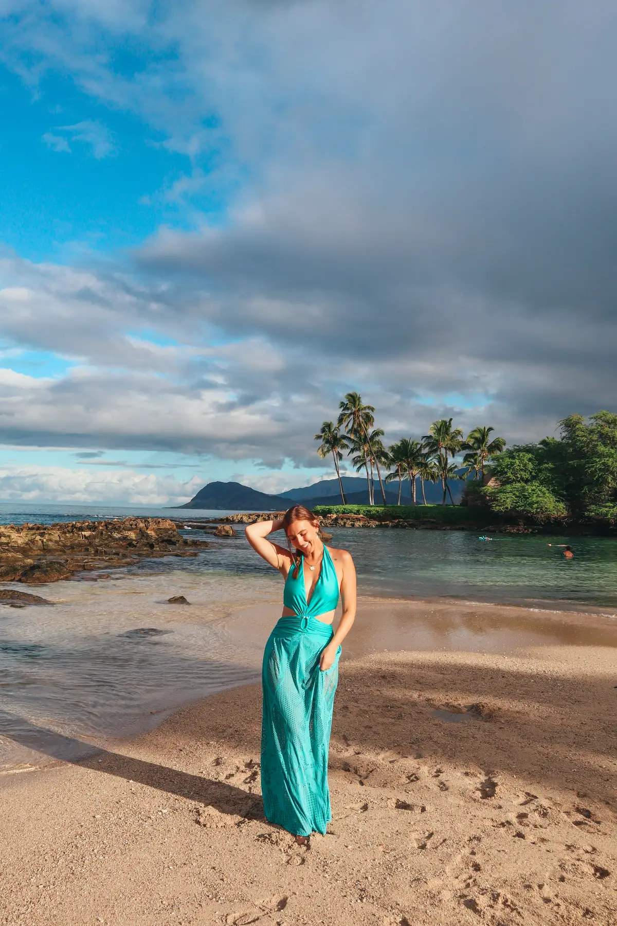 Woman Posing In Dress At Lagoon At Ko Olina