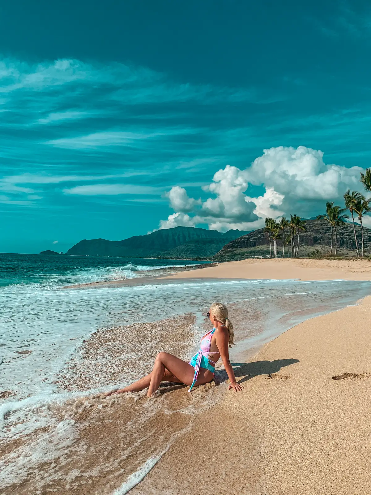 Woman Relaxing At Maili Beach Park On The West Side Of Oahu