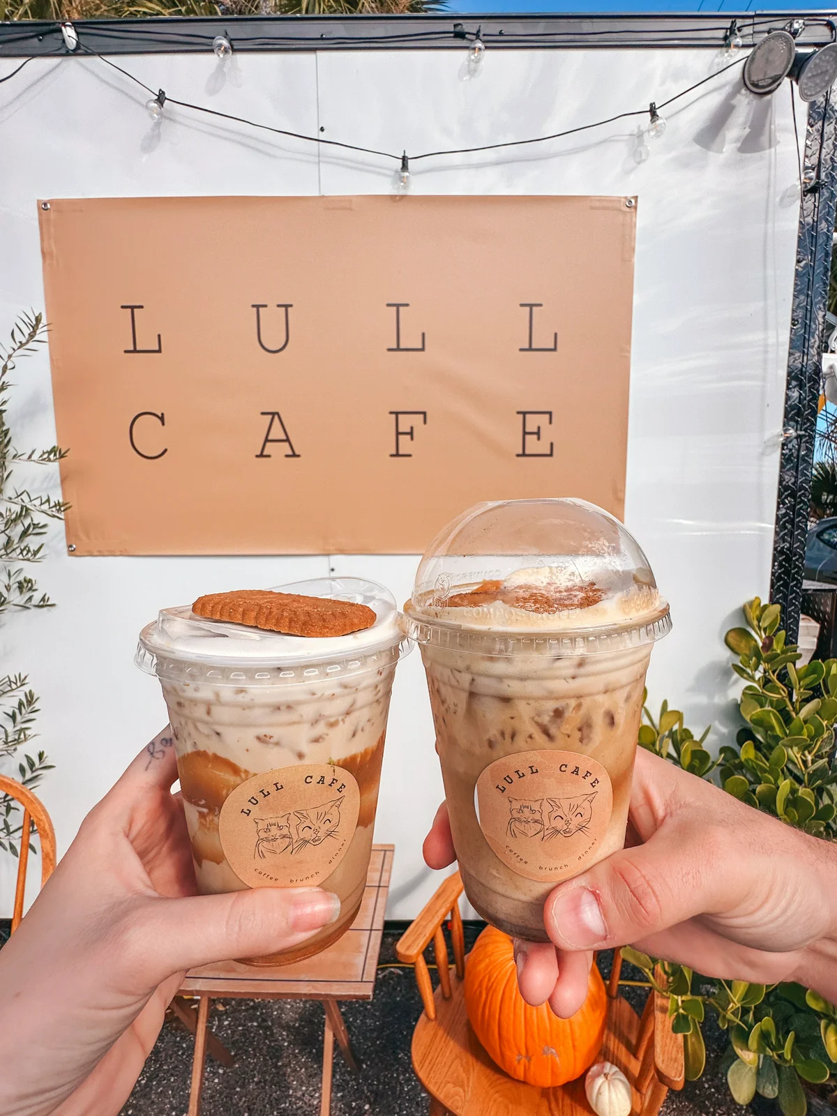 Cheersing Iced Lattes At Lull Cafe In Tampa