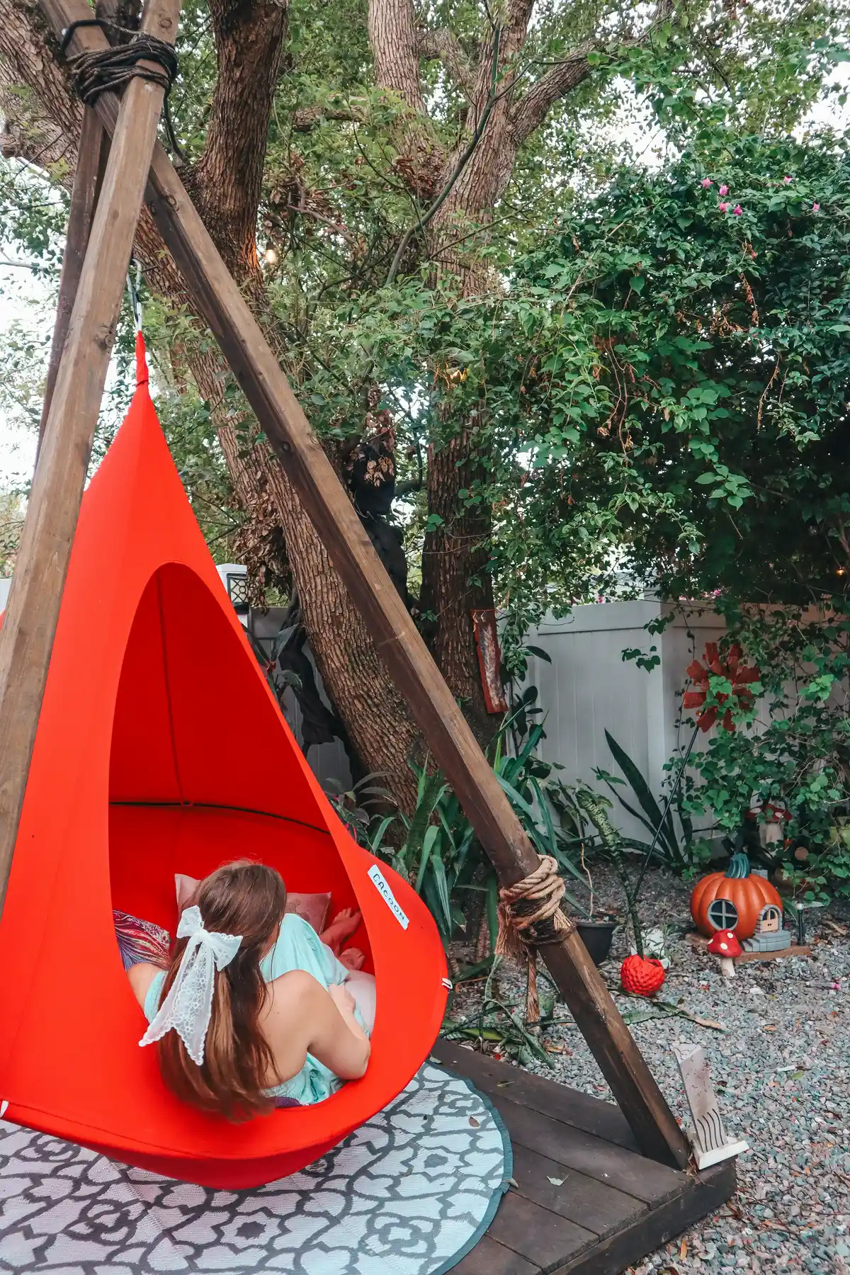 Hanging Chair In Yard At Cozy AF Tiny House In Tampa