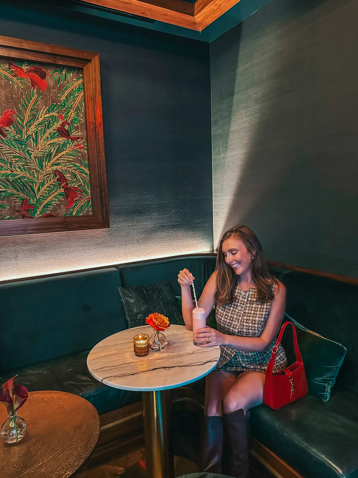 Woman Enjoying Her Cocktail At Pluma Lounge In Downtown St Pete
