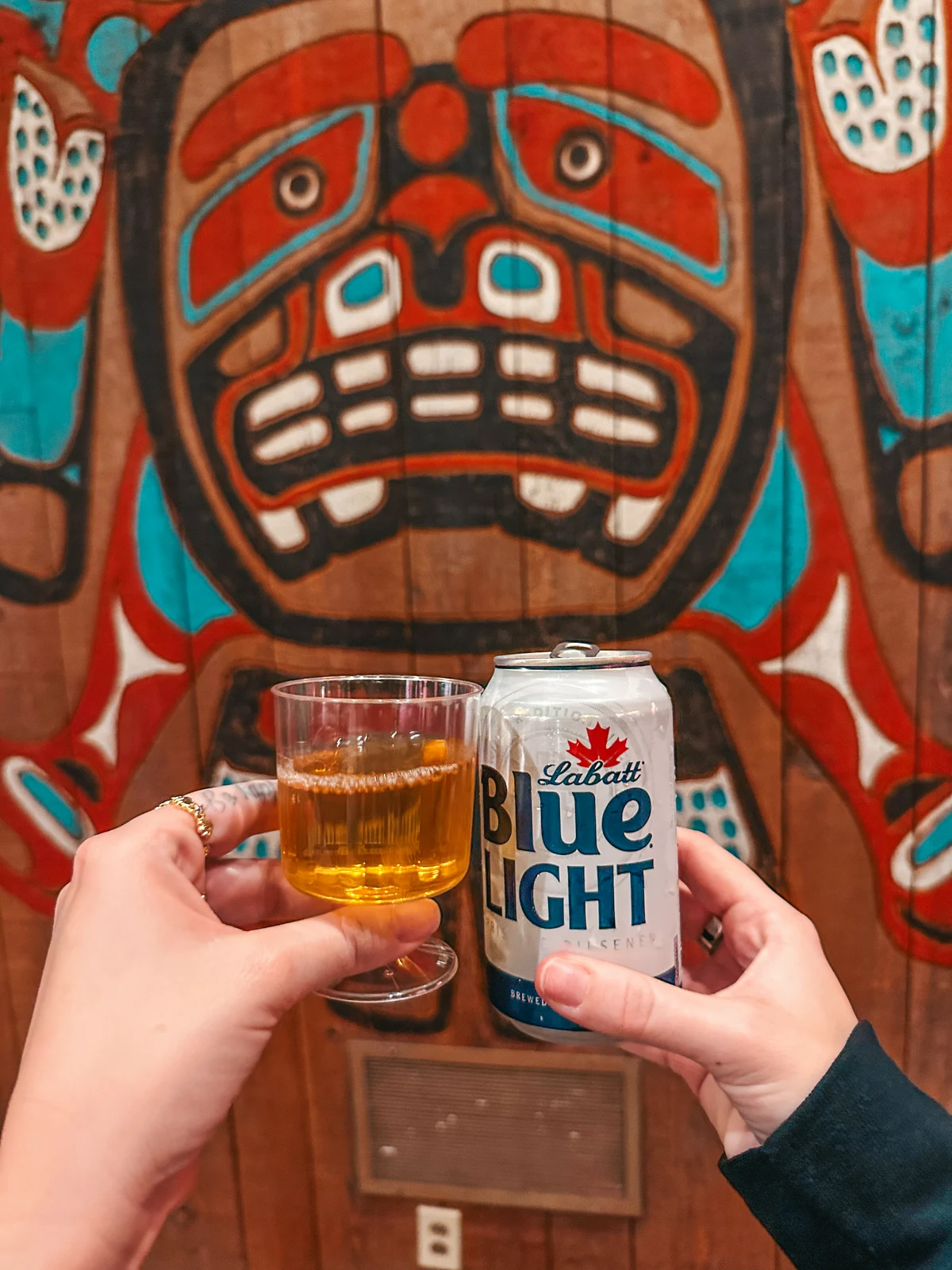Cheersing A Canadian Ice Wine And Labatt Blue Light At The Canada Pavilion At Epcot Walt Disney World