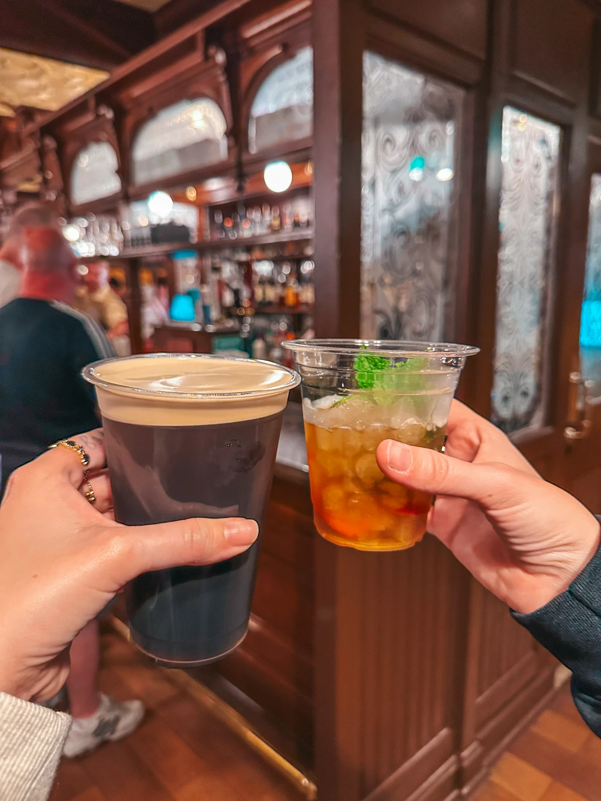 Drinking Around The World In Epcot UK Pavillion Cheersing Guiness And Pimms Cup