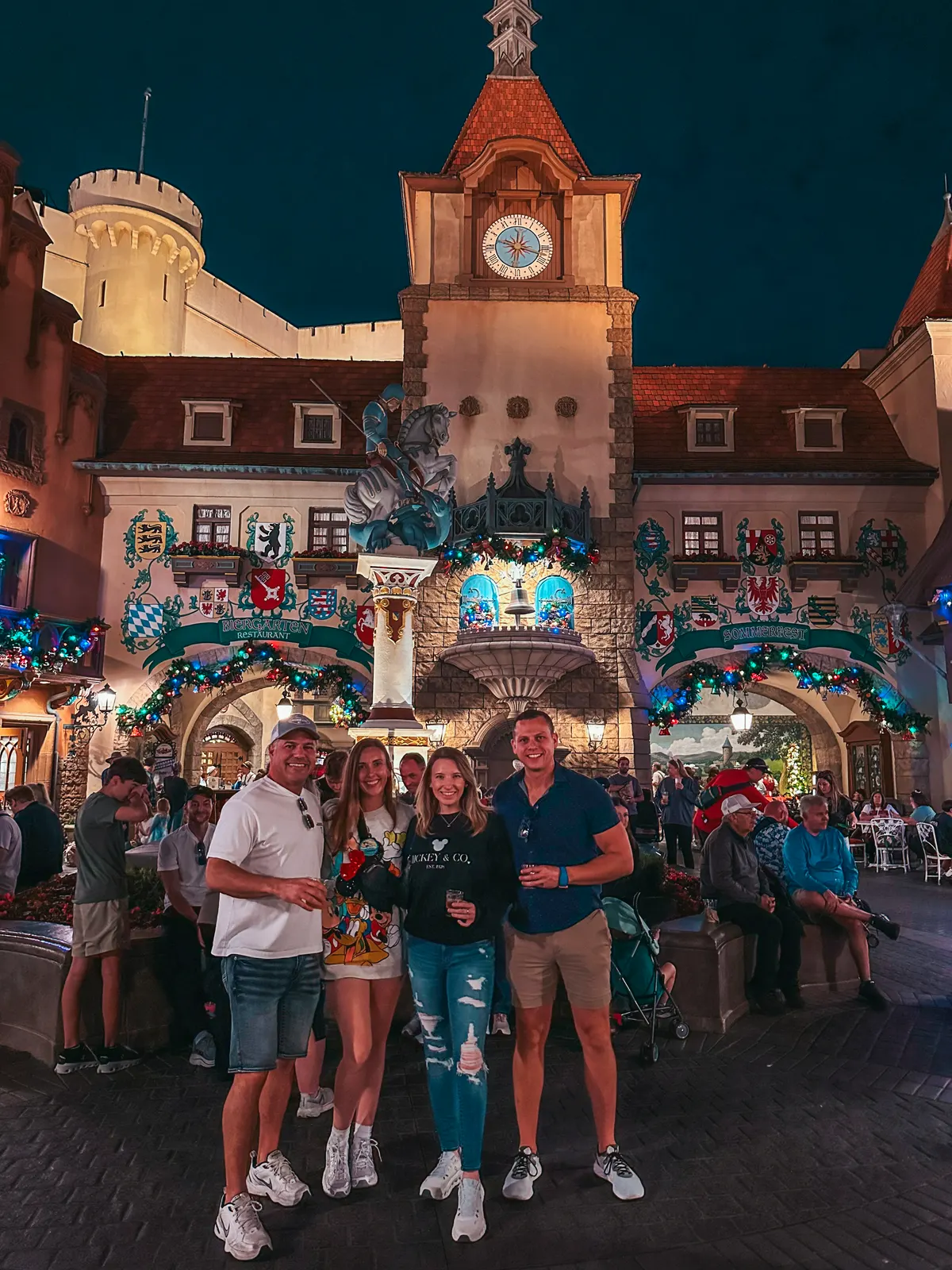 Friends Posing For Picture At The Germany Pavilion In Epcot