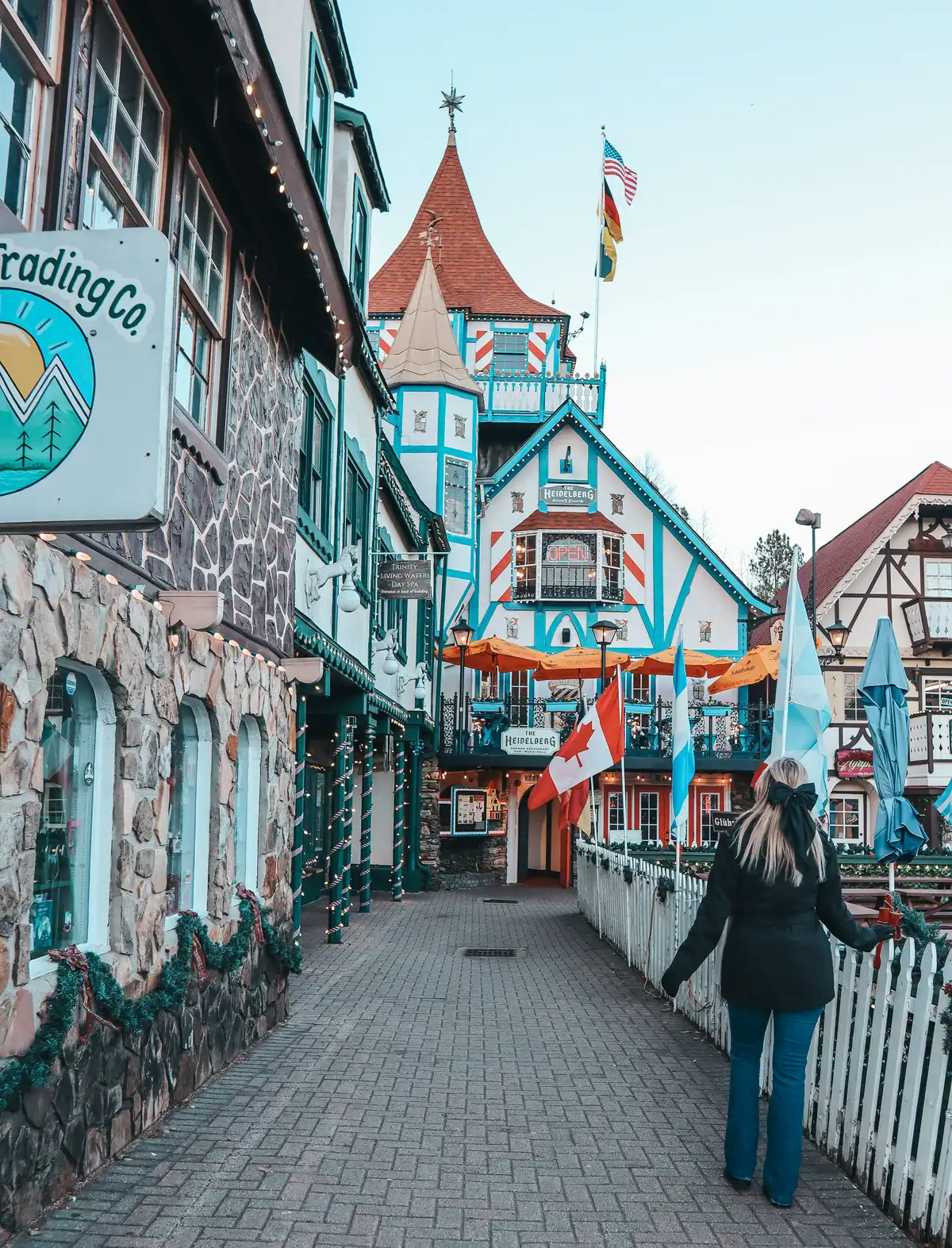 Woman Admiring Decor In Downtown Helen Georgia For Christmas