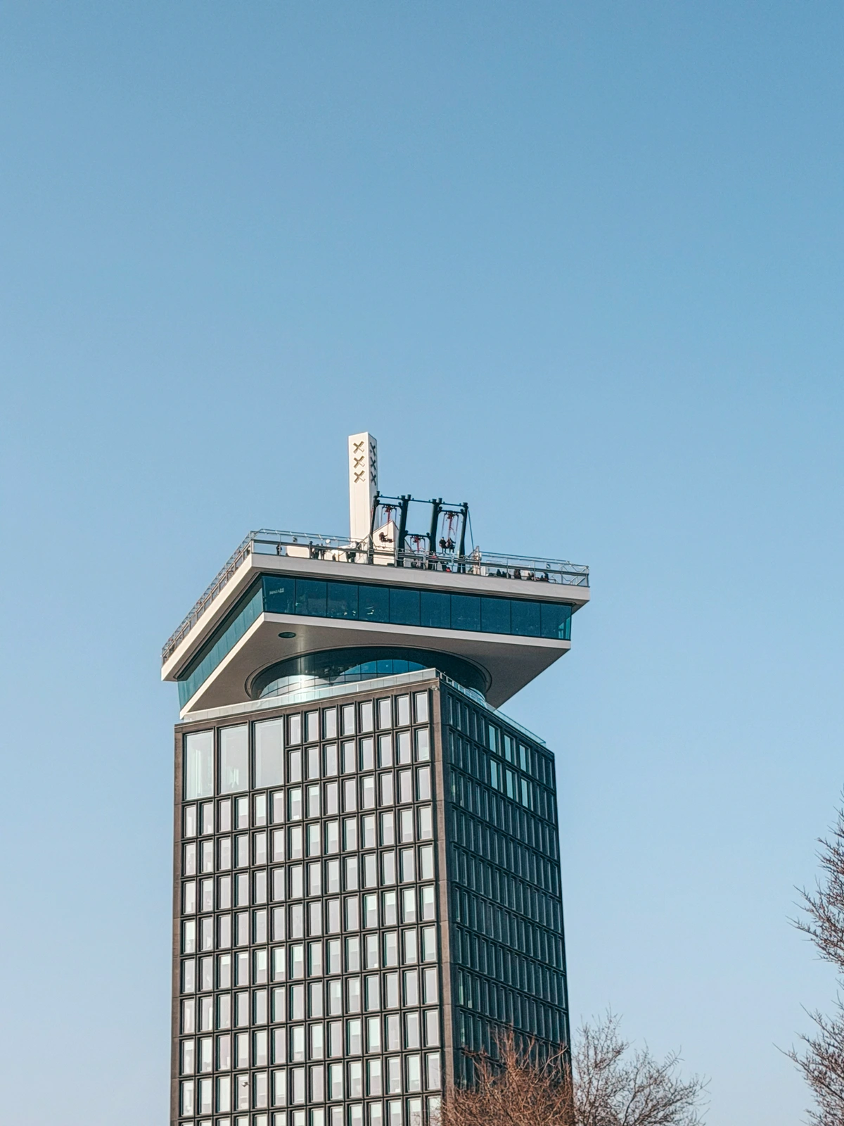 View from the ground of the Over the Edge Swing at the ADAM Lookout in Amsterdam View From The Ground Of The Over The Edge Swing At The ADAM Lookout In Amsterdam
